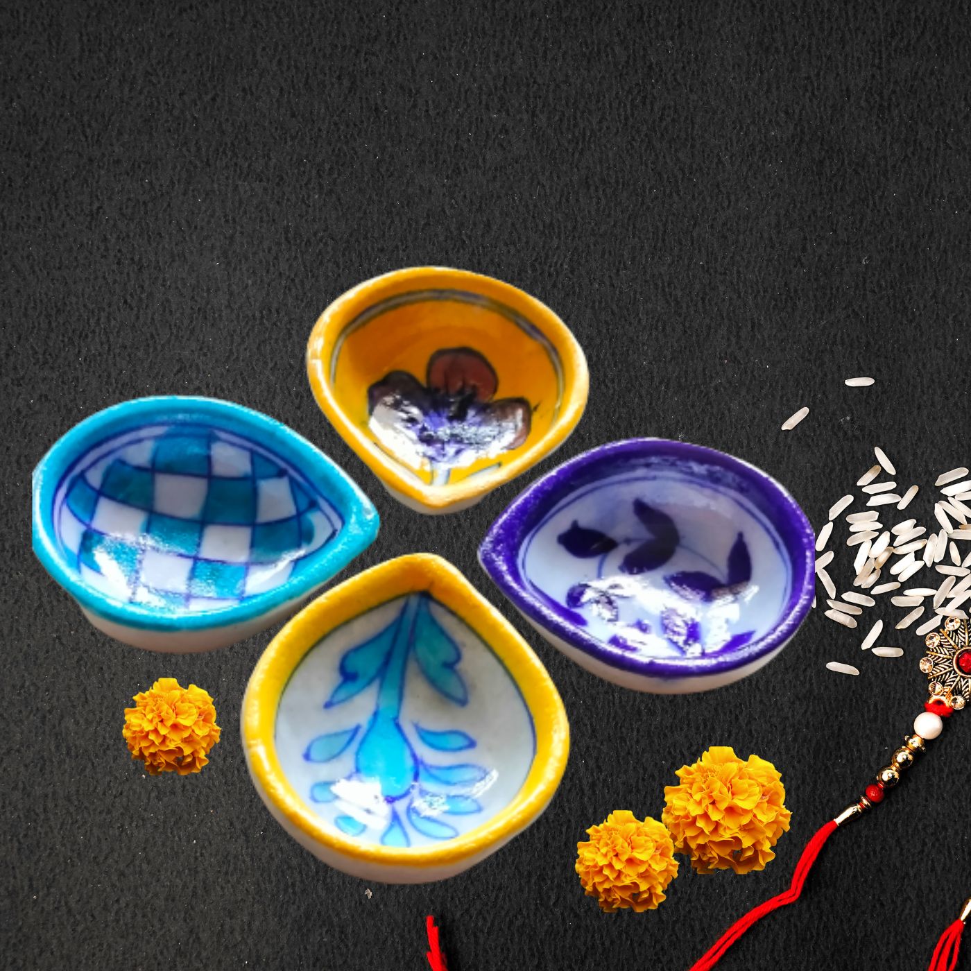 Blue Pottery Diyas in Multi Color Designs- Set Of 4